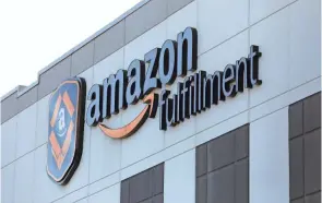  ?? ADAM CAIRNS/COLUMBUS DISPATCH ?? Amazon said Tuesday it plans to hire 2,500 more workers in greater Columbus, including at its distributi­on center in Etna.