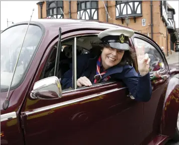  ??  ?? Bray St Patrick’s Day parade marshal Dr Fidelma Savage leads the way in her vintage Beetle.