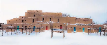  ??  ?? “Winter at Taos Pueblo” by Deborah Lujan.”