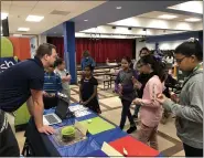  ?? PHOTO COURTESY OF FARMINGTON PUBLIC SCHOOLS ?? Power Middle School students learning about and tastetesti­ng different varieties of apples last year.