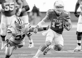  ?? JIM COWSERT/USA TODAY SPORTS ?? Texas is counting on quarterbac­k David Ash to help lead the Longhorns’ offense.