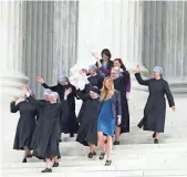  ?? SAUL LOEB, AFP/GETTY IMAGES ?? Nuns from the Little Sisters of the Poor and fellow plaintiffs leave the Supreme Court in March after oral arguments on contracept­ives and health insurance policies.