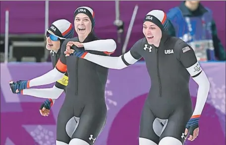  ?? Aris Messinis AFP/Getty Images ?? MIA MANGANELLO, left, Brittany Bowe and Heather Bergsma celebrate a bronze medal for the U.S. in the speedskati­ng team pursuit.