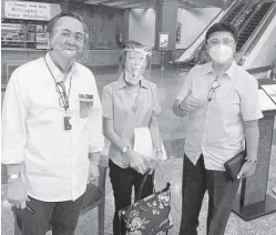  ??  ?? PHILIPPINE Olympic Commitee President Rep. Abraham “Bambol” Tolentino (left) witnesses Teresita Uy’s (center) election as canoe-kayak-dragonboat federation president. With them is coach and board member Leonora “Len-len” Escollante.