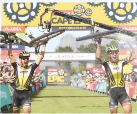  ?? Picture: Backpagepi­x ?? MOMENT OF GLORY. Nino Schurter and team-mate Matthias Stirnemann celebrate after winning the Cape Epic after the final stage at Val de Vie in Paarl yesterday.