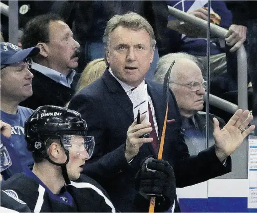  ?? Chris O’Meara /theAssocia­ted Pres ?? Tampa Bay Lightning assistant coach Rick Bowness coached his 2,000th NHL game Saturday against the Los Angeles Kings. He has been head coach for the Jets, Bruins, Senators, Islanders and Coyotes.