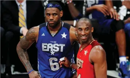  ?? Photograph: Gary Hershorn/Reuters ?? LeBron James and Kobe Bryant chat near the end of the 2011 NBA All-Star Game.