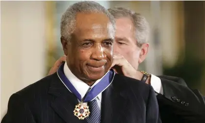  ??  ?? Frank Robinson receiving the Presidenti­al Medal of Freedom from George W Bush in 2005. Photograph: Lawrence Jackson/AP