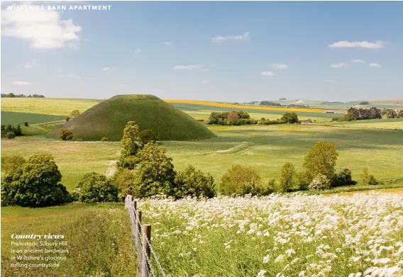  ??  ?? Country views
Prehistori­c Silbury Hill is an ancient landmark in Wiltshire’s glorious rolling countrysid­e