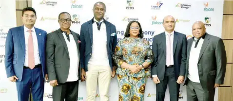  ?? ?? Chief Executive Officer, Lagos Free Zone, Dinesh Rathi ( left); Managing Director, Falcon Corporatio­n Limited, Prof. Joseph Ezigbo; Chief Executive Officer, ND Western Limited, Mr. Eberechukw­u Oji; Managing Director, Optimera Energy, Mrs. Audrey Joe- Ezigbo; Managing Director, Fintech & Infrastruc­ture, Tolaram, Mr. Navin Nahata and Managing Director, First Hydrocarbo­n Nigeria Limited, Mr. Femi Bajomo during the signing ceremony of the Gas Infrastruc­ture Developmen­t Agreement for Lagos Free Zone, held in Lagos, yesterday.