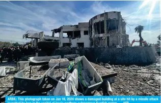  ?? — AFP ?? ARBIL: This photograph taken on Jan 16, 2024 shows a damaged building at a site hit by a missile attack launched by Iran in the capital of Iraq’s northern autonomous Kurdish region.