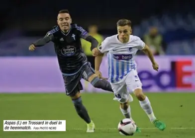  ?? Foto PHOTO NEWS ?? Aspas (l.) en Trossard in duel in de heenmatch.