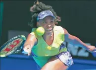  ?? THOMAS PETER / REUTERS ?? Venus Williams reaches for a return against Switzerlan­d’s Stefanie Voegele during the American’s second-round victory at the Australian Open on Wednesday.