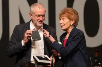  ??  ?? Turner with Labour leader Jeremy Corbyn at the GMB Congress in Bournemout­h last year (Getty)