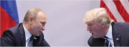  ?? REUTERS ?? RUSSIA’S PRESIDENT Vladimir Putin talks to US President Donald Trump during their bilateral meeting at the G20 summit in Hamburg, Germany on July 7.