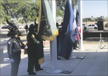  ?? ?? A U.S. CUSTOMS AND BORDER PROTECTION Honor Guard presents the colors during Monday morning’s annual Law Enforcemen­t Memorial and Wreath Laying Ceremony held at the Yuma Sector Headquarte­rs building.