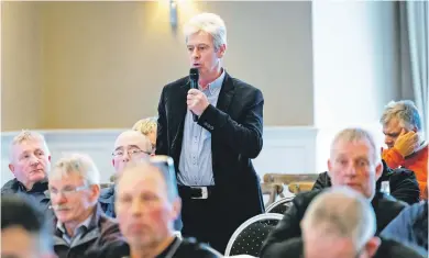  ?? ?? RIGHT: Noel Murphy, Chairperso­n of ICMSA Dairy Committee, makes a point from the floor at the national AGM.
