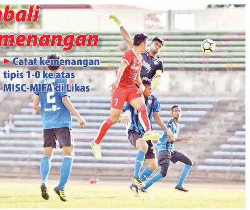  ?? Gambar ihsan Freddie Anthony Jacob ?? PENYERANG Sabah, Shariman Mukarim bersaing di udara dengan penjaga gol MISC-MIFA pada saingan Kumpulan A liga Piala Presiden di Stadium Likas pada Khamis.