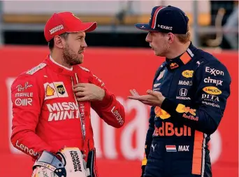  ?? AFP ?? Sotto i riflettori A sinistra Sebastian Vettel, 32 anni, 4 volte iridato con Max Verstappen, 22 anni, 7 vittorie in F.1