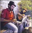  ?? (AFP) ?? Iraqi Kurdish street musicians perform at the central square near the Citadel in Erbil, the capital of the autonomous Kurdish region of northern Iraq on June 1.