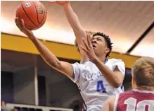  ?? PHOTO BY MICHAEL MURPHY/THE TENNESSEAN ?? McCallie’s Jr. Clay drives to the basket during Thursday afternoon’s Division II-AA state semifinal against MBA at Lipscomb University in Nashville. Clay scored 34 points to lead McCallie to a 62-45 victory.