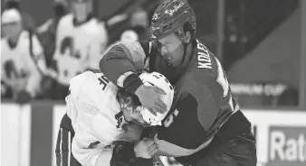  ?? RON CHENOY/USA TODAY SPORTS ?? Golden Knights right wing Keegan Kolesar (55) and Avalanche defenseman Dan Renouf (2) square off at Ball Arena.