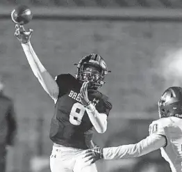  ?? Billy Calzada / Staff photograph­er ?? Brennan’s Ashton Dubose threw for six TDs — including three to twin brother Aaron — and ran for a seventh in Friday’s third-round win over Austin Bowie.