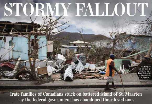  ?? MARTIN BUREAU/AFP/GETTY IMAGES ?? As many as 70 per cent of all homes have been destroyed of damaged on St. Maarten.