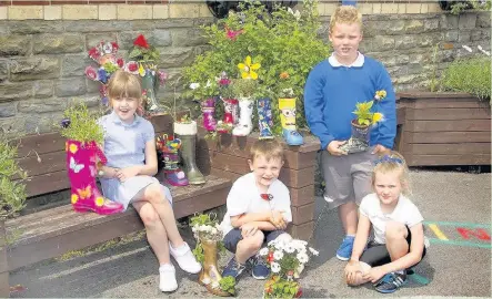  ?? WAYNE HANKINS ?? Penrhiwcei­ber Primary School held a ‘flower in a welly’ competitio­n