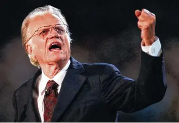  ?? Associated Press ?? Billy Graham’s famous crusades were evenings of music and sermons that would build toward Graham’s altar call. Hundreds would come forward to give their lives to Jesus Christ.