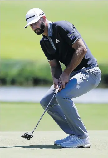  ?? SETH WENIG/THE ASSOCIATED PRESS ?? Dustin Johnson may have missed a few putts on Friday at the U.S. Open at Shinnecock Hills in Southampto­n, N.Y., but he made enough to build a four-shot lead heading into the weekend.
