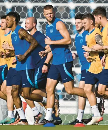  ?? PAUL ELLIS/GETTY-AFP ?? England trains Thursday ahead of its World Cup group-play match against the United States on Friday.