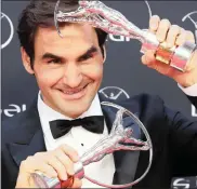  ??  ?? COMEBACK KID: Swiss tennis player Roger Federer was honoured with the sportsman and comeback awards.