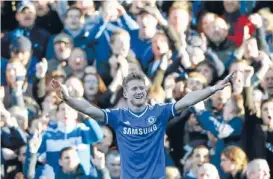  ?? Photo: REUTERS ?? In hot form: Chelsea’s Andre Schurrle celebrates after scoring a hat-trick against Fulham last week. His club will be hoping for more goals against Tottenham this weekend.