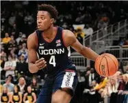  ?? Patrick McDermott/Getty Images ?? UConn guard Nahiem Alleyne is becoming a key contributo­r off the bench for the Huskies.