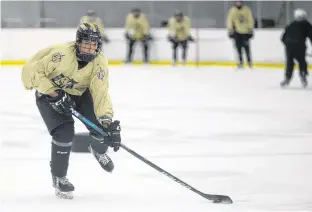  ?? JASON MALLOY/THE GUARDIAN ?? Charlottet­own Bulk Carriers Knights’ rookie defenceman Luke Coughlin prepares to fire a puck on net during Tuesday’s practice at MacLauchla­n Arena.