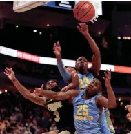  ?? JEFF HANISCH / USAT ?? Koby McEwen (25) and Jamal Cain battle for a rebound against Purdue in 2019. McEwen and Cain entered the NCAA transfer portal.