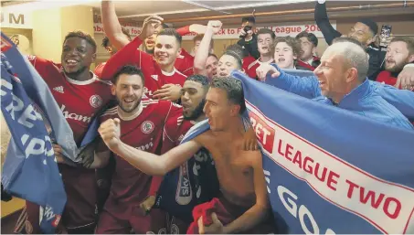  ??  ?? Minnows Accrington Stanley celebrate winning promotion from Sky Bet League Two after last night’s 2-0 home win over Yeovil.