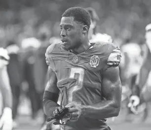  ?? JUNFU HAN/DETROIT FREE PRESS ?? Detroit Lions safety C.J. Gardner-Johnson walks off the field after a 37-31 loss to the Seattle Seahawks at Ford Field in Detroit on Sept. 17.