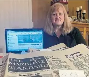  ?? RIHANNA HAWKEN ?? Elaine Smyth of Markdale saved a stack of Markdale Standard newspapers from the trash in 2014. She's been posting memories from the paper ever since, with community members keen to talk about the posts, and how they miss their local paper.