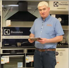  ??  ?? Mike Walsh of Walsh Bros Electrical showing the range of top quality electrical goods at their store in Rock Street, Tralee.