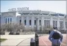  ?? John Minchillo / Associated Press ?? Yankee Stadium as it remained closed due to COVID-19 on March 26.