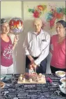  ??  ?? LIFELINE: Harry celebrated his 90th birthday with volunteers from the Hayes Contact the Elderly