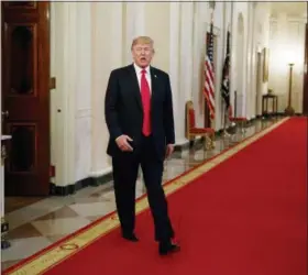  ?? EVAN VUCCI — ASSOCIATED PRESS ?? President Donald Trump arrives in the East Room of the White House on Thursday to speak at an Opioid Summit.