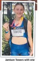  ??  ?? Jamison Towers with one of her four medals from the championsh­ips.