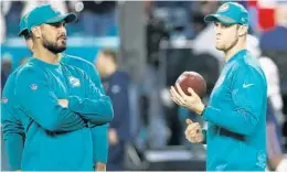  ?? WILFREDO LEE/AP ?? Matt Moore, left, played in four games this season. The Dolphins brass thinks that if Ryan Tannehill, right, had been healthy, the team would have made the playoffs.