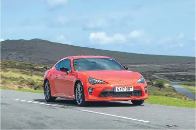  ??  ?? Bright future: Toyota’s GT86 Orange Edition.