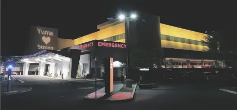  ?? LOANED PHOTO ?? YUMA REGIONAL MEDICAL CENTER glows gold during the “Shine a Light” campaign to bring awareness to the darkness of childhood cancer during National Childhood Cancer Awareness Month. Through Sept. 30, the foundation will give a special gold light bulb to anyone donating $10 or more to the Pediatric Oncology Support fund.