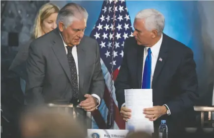  ?? AP PHOTO ?? Vice President Mike Pence, right, and Secretary of State Rex Tillerson, left, speak together after the National Space Council’s first meeting held at the Steven F. Udvar-Hazy Center, Thursday, Oct. 5, 2017, in Chantilly, Va.