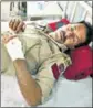  ?? HT PHOTO ?? A cop injured in firing undergoes treatment at a hospital in Jammu.